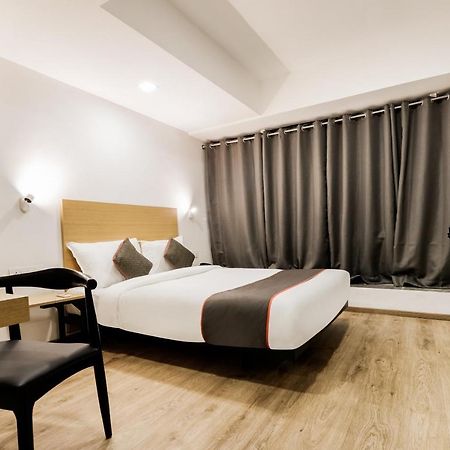 Oyo Townhouse 169 Aqua Corridor Hotel Bhatha Bagian luar foto